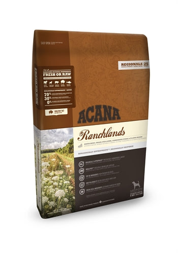 Acana Highest Protein Ranchlands hondenvoer, 11,4kg zak, met afbeeldingen van rundvlees, lamsvlees, varkensvlees en verse groenten.